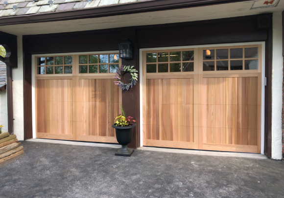 steel garage door with unfinished wood overlays